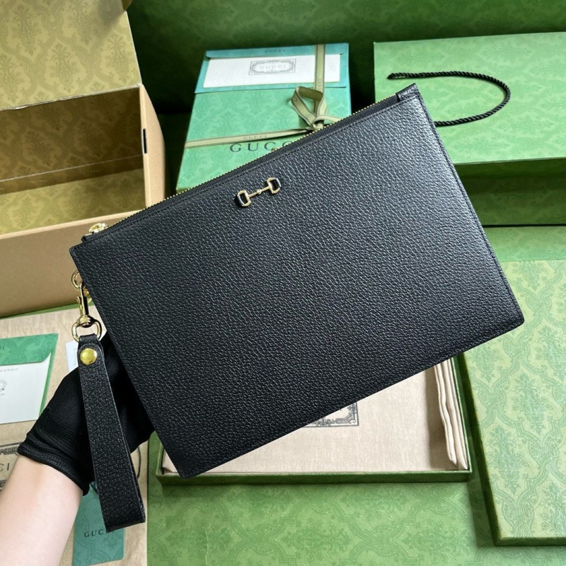 G*u*i clutch bags